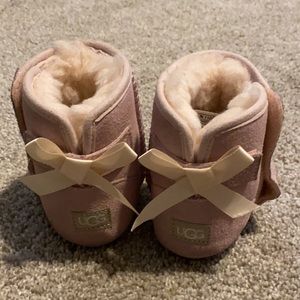 Baby girl Ugg’s. Light pink. Size 4/5 (infant). Lightly used.